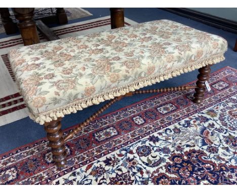   A Victorian bobbin turned walnut stool, length 116cm, depth 56cm, height 48cm