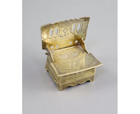   A late 19th century Russian 84 zolotnik silver gilt salt thronewith engraved decoration and cyrillic script, unknown master