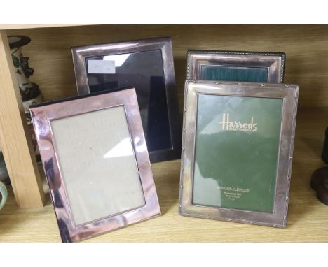   3 silver plated frames and one other, 19.5 x 14.5cm, 18 x 13cm, 17 x 12cm and 17 x 11.5cm