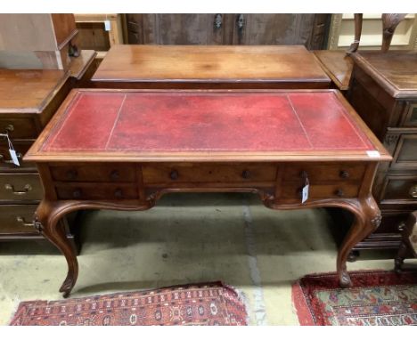   A Victorian walnut kneehole rosewood desk by Wilkinson &amp; Son, Old Bond Street, stamped 11761, width 134cm, depth 64cm, 