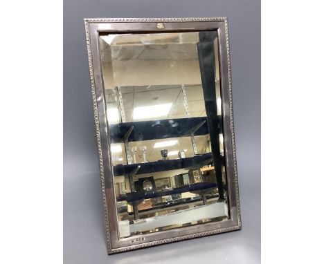   A late Victorian silver mounted rectangular easel mirror, with monogram applique, Drew &amp; Sons, London, 1900, 35.5cm.