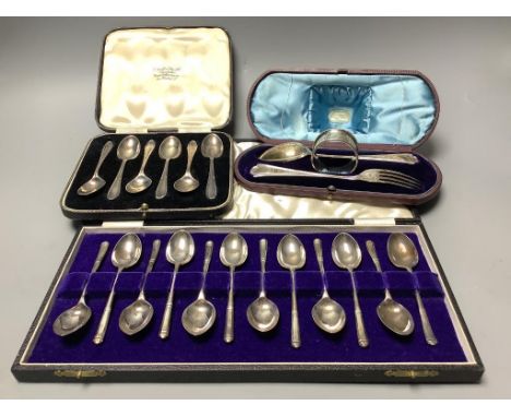   A cased Victorian silver christening trio, Martin, Hall &amp; Co, Sheffield &amp; London, 1879 and two other cased sets of 