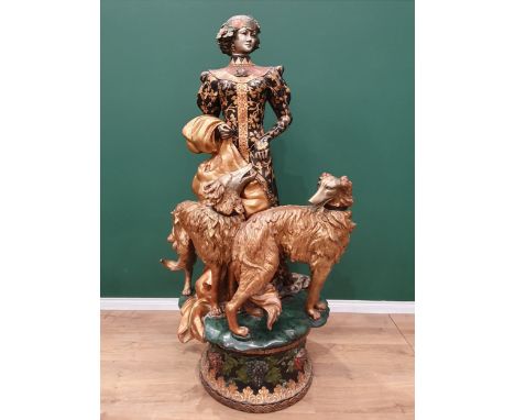 A large and impressive painted Sculpture Group possibly bronze, of a lady in 1920's style costume, wearing a headdress, with 