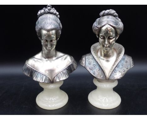 A pair of modern plated Busts of female figures on onyx bases, 10½in 