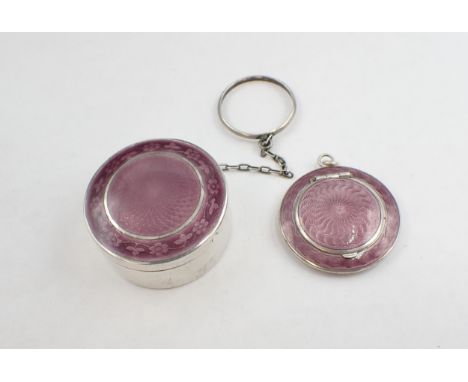 Two small mauve enamel on silver Compacts 