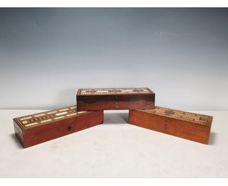 Two 19th Century parquetry Cribbage Boxes with hinged covers and containing bone dominoes and an inlaid wooden Cribbage Box c