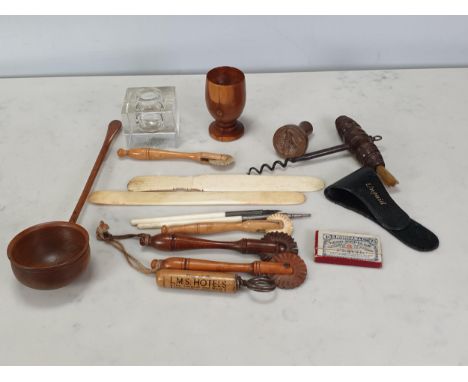 A Collection of treen and other items including a Ladle, an Egg Cup, Pastry Cutters, a Corkscrew with brush 