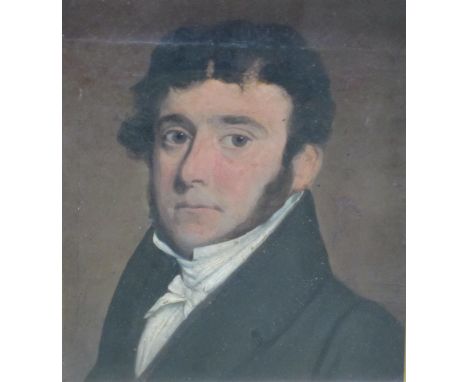 FOLLOWER OF JOHN LINNELL (1792-1882). Portrait of a Gentleman, head and shoulders, wearing a black coat, oil on canvas, laid 