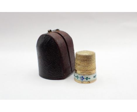 A silver gilt Thimble with enamel band painted forget-me-nots in leather case 