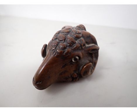 A carved treen Snuff Mull in the form of a ram's head with inset glass eyes, 3inLots of additional images on website. A small