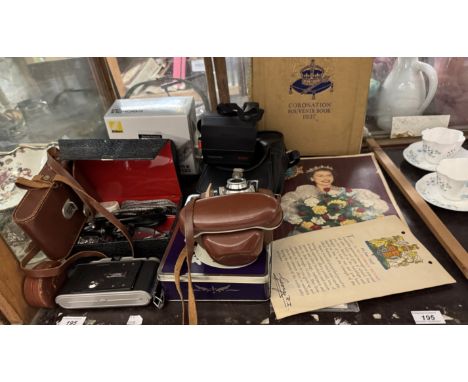A Kodak Coloursnap 35 camera together with other cameras, travel iron, Coronation books etc 