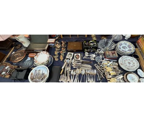 A collection of Hummel figures together with assorted pottery plates, laptop desk, electroplated cutlery, plates, dishes, bin
