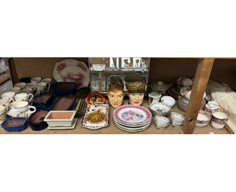 Two Sylvan character jugs together with Poole pottery dishes, commemorative mugs, part tea services, planters, mirror etc 