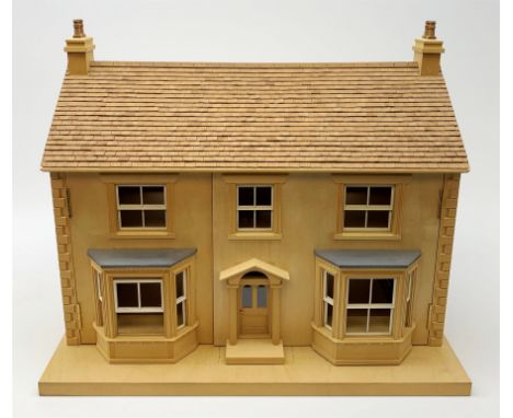 A 24th scale wooden model of a house, or dolls house, with 'tiled' roof, sash windows, and two bay windows to the hinged fron
