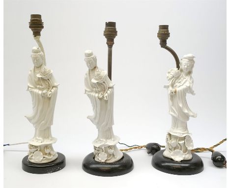 Three blanc de chine figures, modelled as Guanyin, each mounted upon a lamp base, (a/f), figures H26cm. - Condition Report