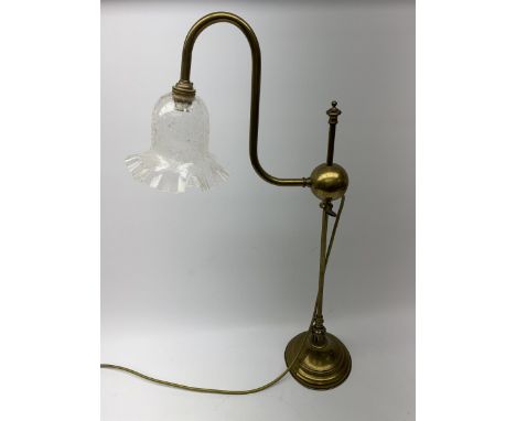 A brass students lamp, with adjustable swan neck and crackle effect clear glass frilled shade, H70cm. - Condition Report 