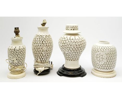 Four Chinese reticulated or pierced white glazed lamp bases, (two without fittings), largest H30cm.  - Condition Report 
