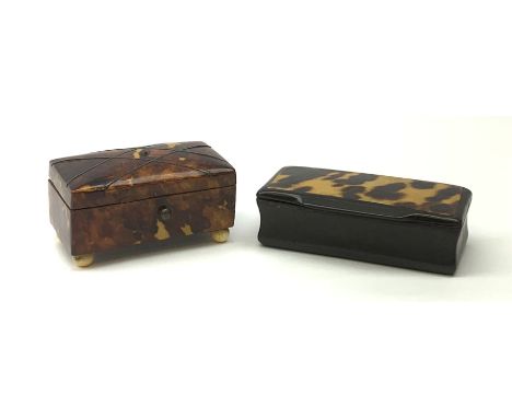 A 19th century tortoiseshell snuff box, with strung detail to the hinged cover, raised upon four ivory bun feet, L6cm, togeth