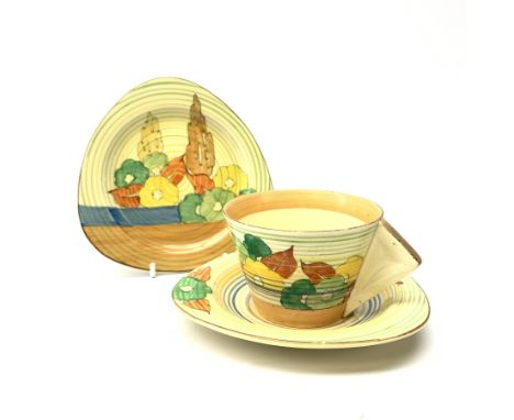 A Clarice Cliff Bizarre by Wilkinson Limited trio in the Capri pattern.  - Condition Report 