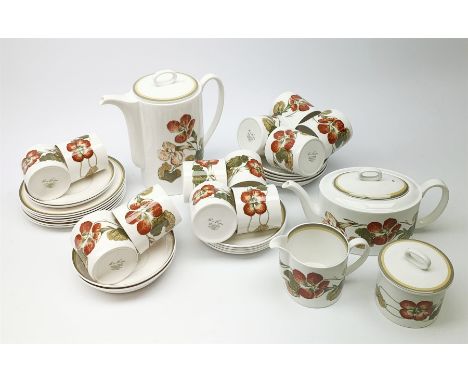 A Susie Cooper Nasturtium pattern tea service, comprising tea pot, coffee pot, six tea cups and six saucers, six coffee cans 