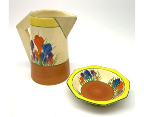 A Clarice Cliff Newport Pottery jug, decorated in the Crocus pattern, H16.5cm, together with a Clarice Cliff Bizarre by Wilki