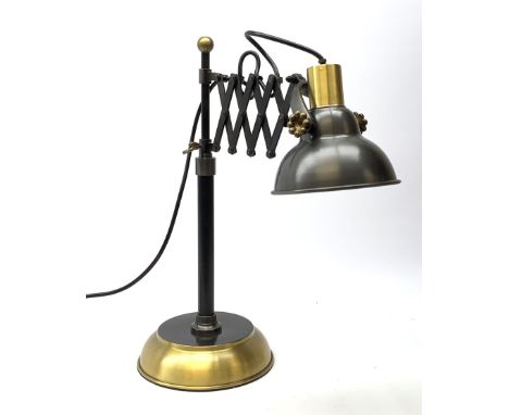 A black metal and brass adjustable scissor lamp, H50cm. - Condition Report