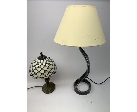 A small Tiffany style table lamp, with leaded glass shade, overall H38cm, together with another table lamp with curved metal 