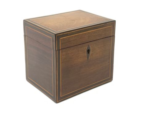 A George III mahogany cube tea caddy, with strung detail, the hinged cover open to reveal a twin compartmented interior, L13 