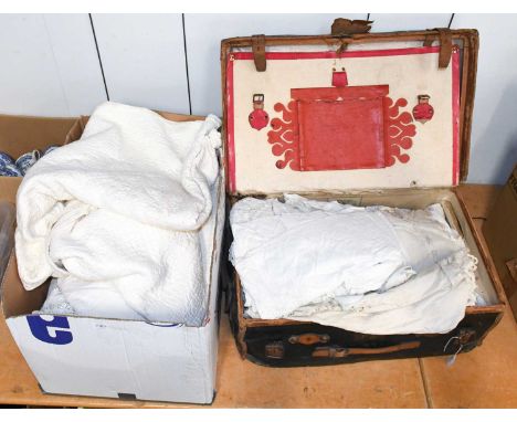 Black Travelling Trunk with red leather mounts inside, black canvas exterior, enclosing a White Quilt, Various Drawn Thread W
