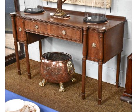 A Regency Style Breakfront Mahogany Sideboard, with reeded top and on ring turned supports, 146cm by 57cm by 96cm