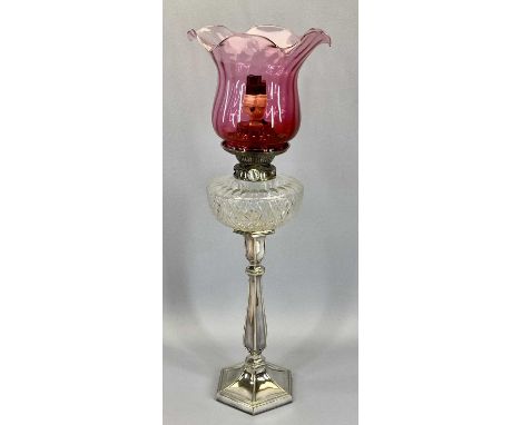 EPNS BASED OIL LAMP - hexagonal form with clear glass reservoir and Cranberry glass shade, 62cms H to the top