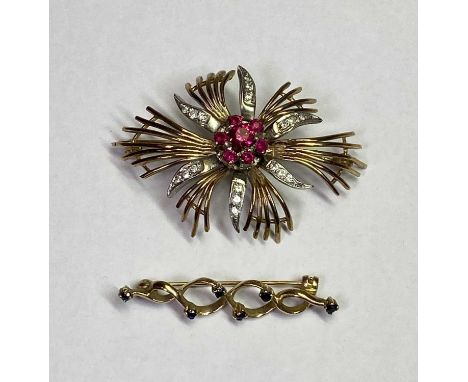 9CT GOLD BROOCHES (2) - to include a ruby and paste set yellow and white gold floral brooch, 5.5 x 3.5cms, 12.6grms and a dou