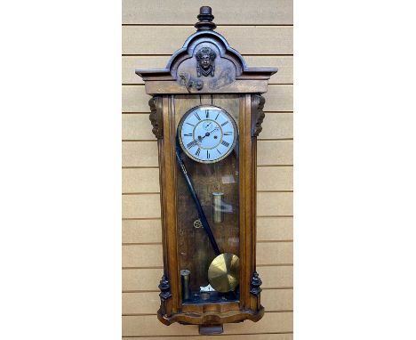 VIENNA WALL CLOCK - 8 day movement with Roman numeral digits on a white painted enamel dial with brass bezel