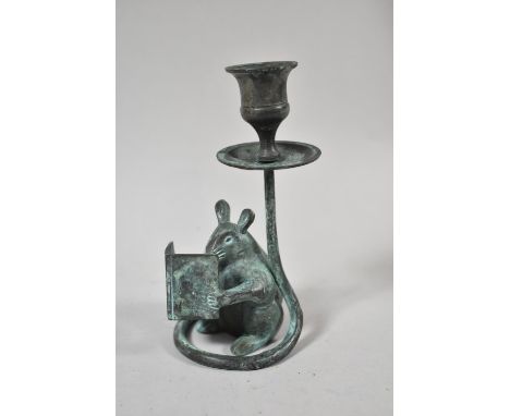 A Patinated Metal Novelty Candle Stick in the Form of a Seated Mouse Reading Book, 14cm high 