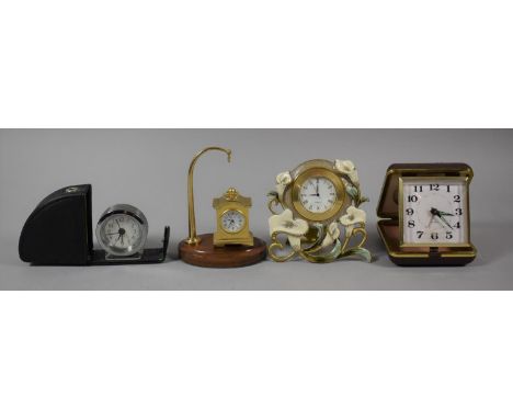 A Travelling Alarm Clock, Two Miniature Brass and Enamelled Mantle Clocks, Stand etc 