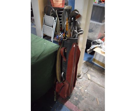 A Vintage Golf Bag Containing PGF Clubs etc 