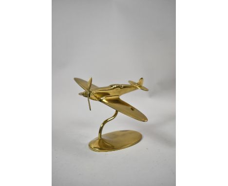 A Desk Top Brass Model of a Spitfire in Flight, 18cm Long 