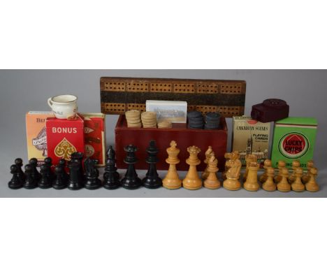 A Collection of Various Vintage Draught and Chess Pieces, Black Knight Missing, Together with Playing Cards, Cribbage Board e