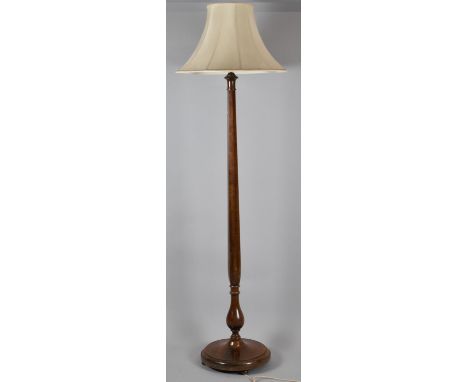 An Edwardian Oak Standard Lamp On Circular Base with Tapering Supports 