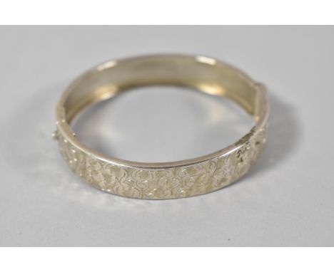 A Silver Bangle Stamped CME 