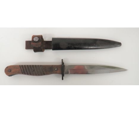 Imperial German Trench Knife5 3/4 inch, single edged blade with back edge sharpened point.  Forte marked "Ern. Ward. Rheinl" 