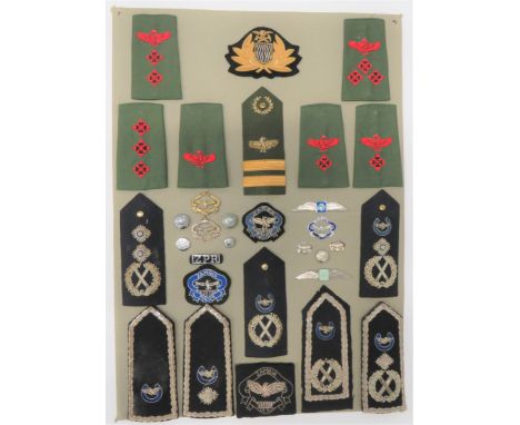 26 Items Of Insignia For Zambian Policedisplay board with good tabulated display of metal and cloth badges including bullion 