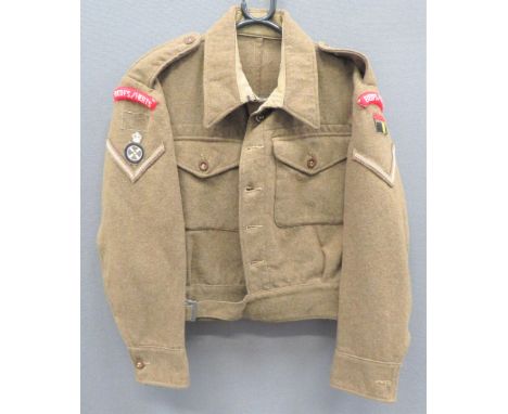 1940 Pattern Bedfs & Herts Battledress Jacketkhaki woollen, single breasted, closed collar, short jacket.  Lower extended bel