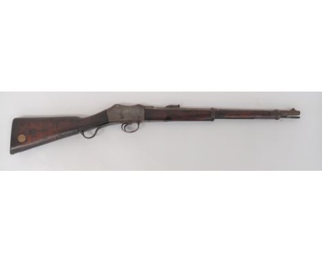 Deactivated Martini Enfield Cavalry Carbine.303, 21 1/4 inch barrel.  Front eared sight.  Rear, small ladder sight.  Flat sid