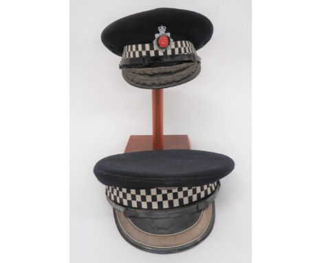 Two Constabulary High Rank Essex Police Officer Peaked Capsconsisting black crown and body.  Black and white checkered band. 