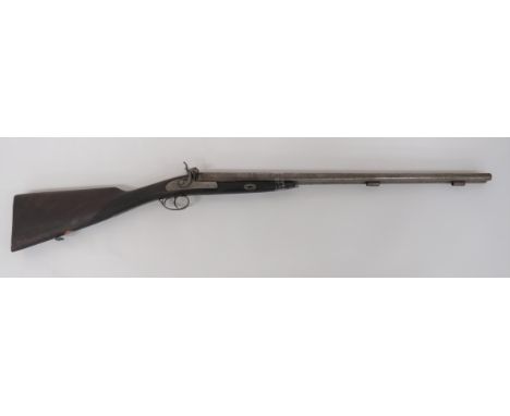 Mid 19th Century Percussion Double Barrel Shotgun16 bore, 27 1/2 inch, Damascus side by side barrels.  Lock plates with anima