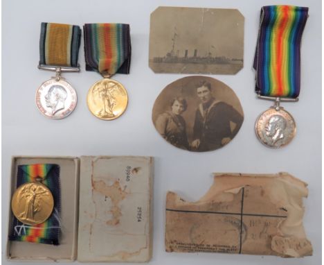 WW1 Royal Navy Pairconsisting silver War medal and Victory named "K. 5058 G. F. Smith Sto.1 RN" with associated photo.  Toget