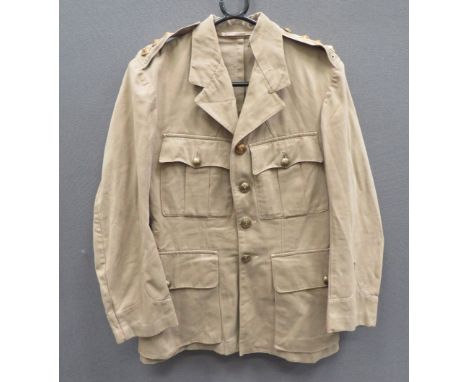 Indian Lancers Khaki Drill Tuniclight khaki drill, single breasted, open collar tunic.  Pleated chest and lower bag pockets, 