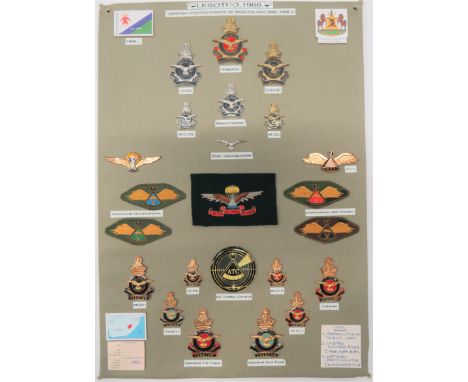 23 Items Of Insignia For Lesotho Post 1966 Air Forcedisplay board with good tabulated display of metal and cloth badges inclu