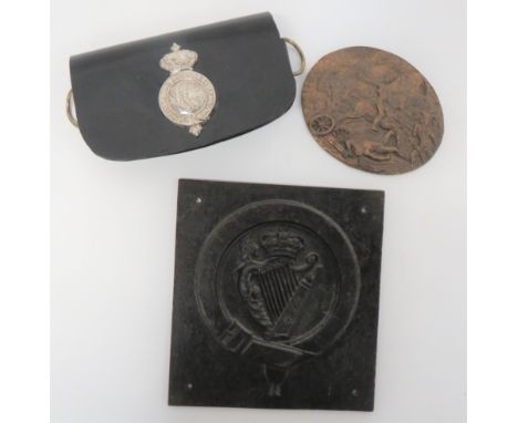 Two Cast Plaquesconsisting cast brass, oval plaque showing British Cavalry charging French Gunners and Infantry ... Cast iron